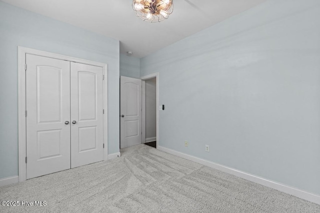109 Creek End Ct, Swansboro, NC 28584 - unfurnished bedroom featuring a closet and carpet