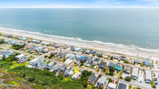 316 E Dolphin Dr, Oak Island, NC 28465 - aerial view of property and surrounding area with extended coastline and nearby suburban area