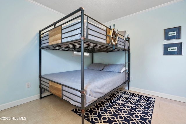 316 E Dolphin Dr, Oak Island, NC 28465 - bedroom with ornamental molding and tile patterned flooring