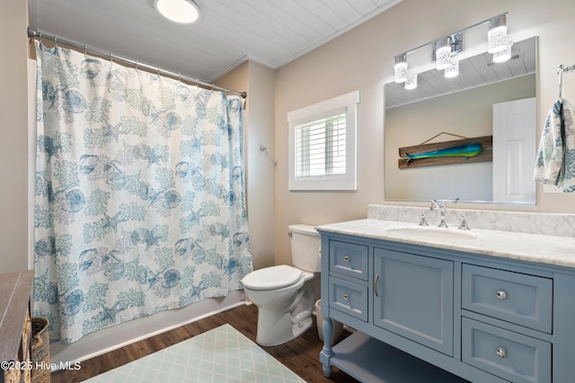316 E Dolphin Dr, Oak Island, NC 28465 - full bath featuring vanity, wood finished floors, and shower / bath combination with curtain