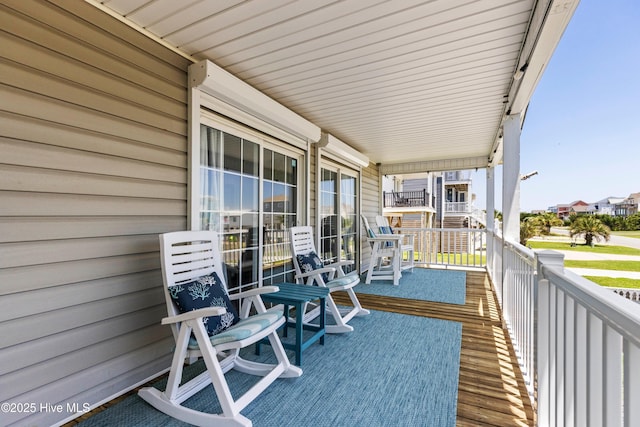 316 E Dolphin Dr, Oak Island, NC 28465 - view of wooden terrace