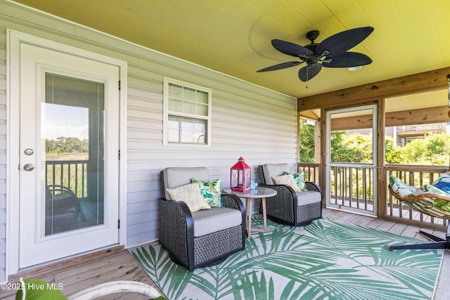 316 E Dolphin Dr, Oak Island, NC 28465 - deck featuring ceiling fan