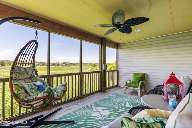316 E Dolphin Dr, Oak Island, NC 28465 - sunroom featuring a ceiling fan and healthy amount of natural light
