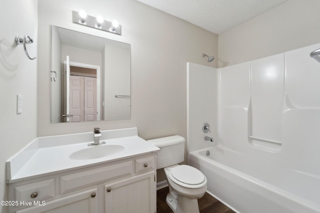802 Mayfield Ct, Wilmington, NC 28411 - full bathroom featuring vanity, bathing tub / shower combination, wood finished floors, and a textured ceiling