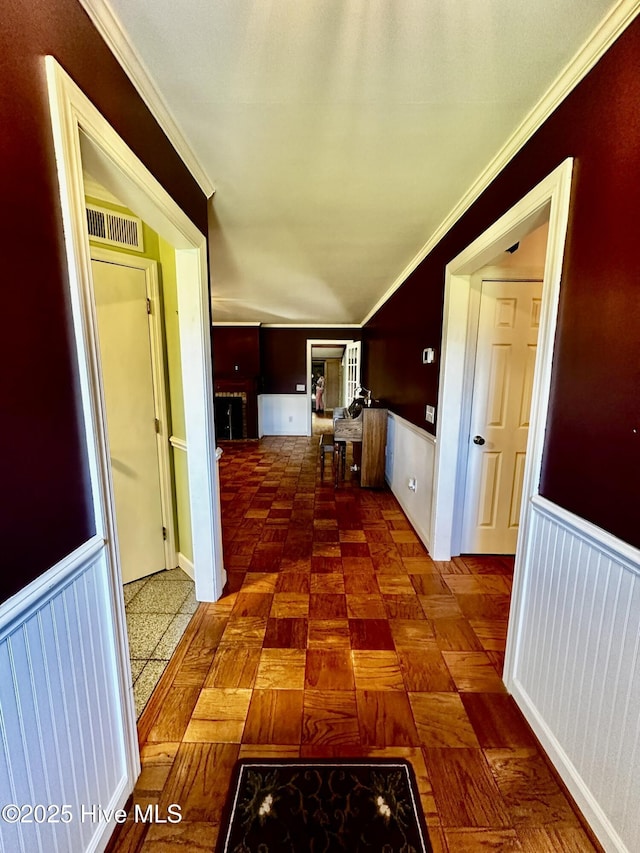 9550 NC-171, Williamston, NC 27892 - hallway featuring wainscoting and crown molding