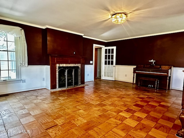 9550 NC-171, Williamston, NC 27892 - unfurnished living room with crown molding and a fireplace with flush hearth