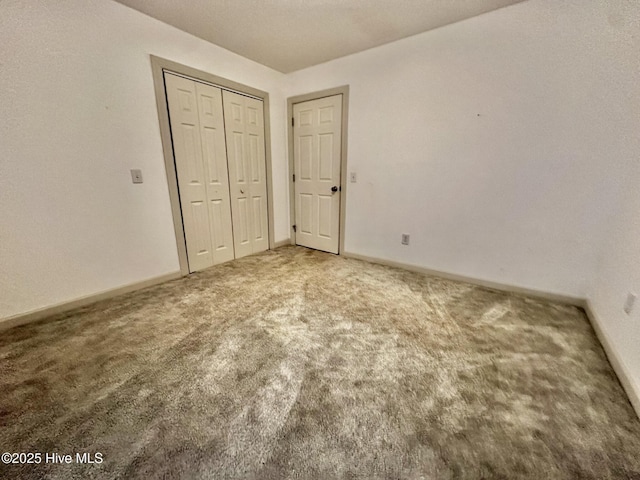 9550 NC-171, Williamston, NC 27892 - unfurnished bedroom with carpet floors and a closet