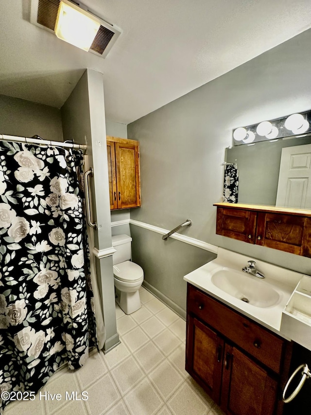 9550 NC-171, Williamston, NC 27892 - full bathroom featuring vanity, tile patterned floors, and a shower with curtain