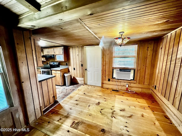 9550 NC-171, Williamston, NC 27892 - kitchen featuring stainless steel electric range, hardwood / wood-style flooring, wood ceiling, cooling unit, and white microwave