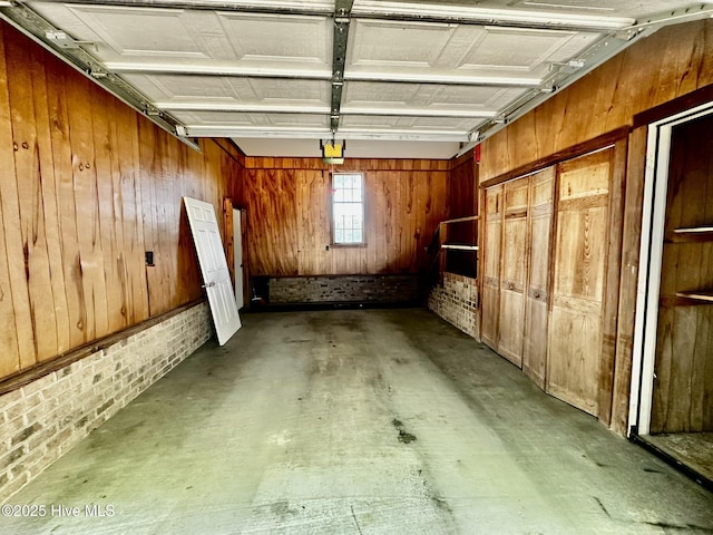 9550 NC-171, Williamston, NC 27892 - garage with wooden walls and a garage door opener