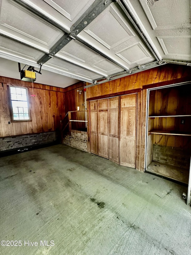 9550 NC-171, Williamston, NC 27892 - garage with wooden walls and a garage door opener