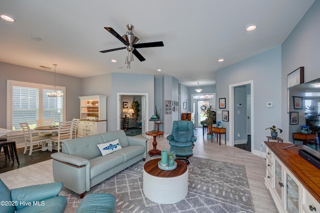 8508 Hammock Dunes Dr, Wilmington, NC 28411 - living room with a chandelier, recessed lighting, a ceiling fan, and wood finished floors