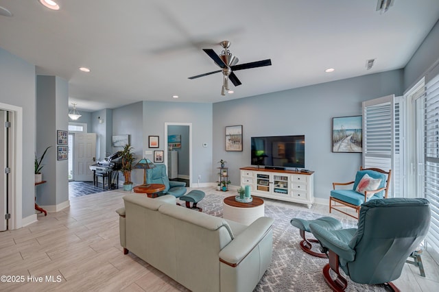 8508 Hammock Dunes Dr, Wilmington, NC 28411 - living room with plenty of natural light, recessed lighting, a ceiling fan, and light wood-type flooring