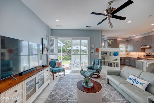 8508 Hammock Dunes Dr, Wilmington, NC 28411 - living area featuring plenty of natural light, a ceiling fan, and recessed lighting