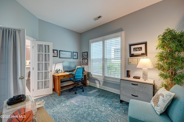 8508 Hammock Dunes Dr, Wilmington, NC 28411 - office space featuring french doors and dark wood-style flooring