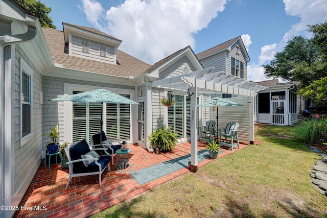 8508 Hammock Dunes Dr, Wilmington, NC 28411 - rear view of house featuring a pergola, roof with shingles, a patio area, and a lawn
