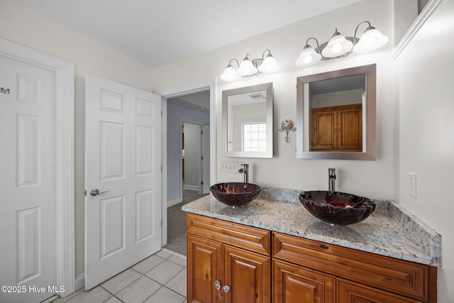 2639 Plumosa Dr, Grimesland, NC 27837 - bathroom featuring tile patterned floors and double vanity