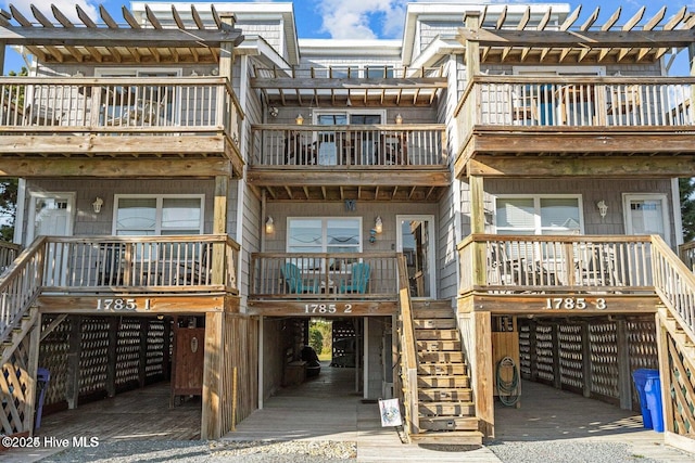1785 New River Inlet Rd Unit 2, North Topsail Beach, NC 28460 - view of building exterior featuring stairs