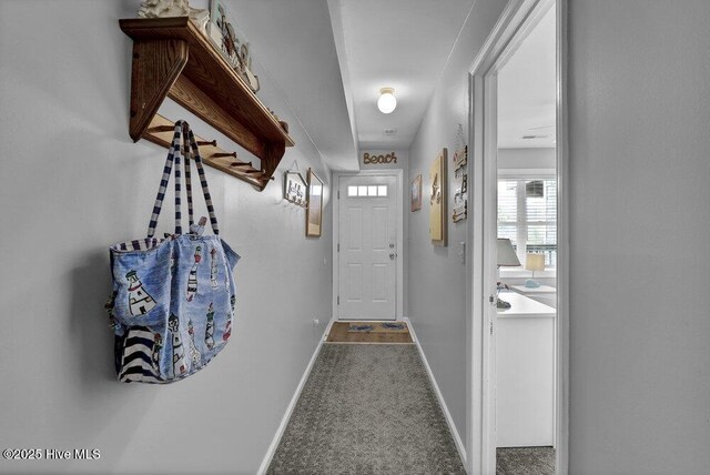 1785 New River Inlet Rd Unit 2, North Topsail Beach, NC 28460 - entryway with carpet floors and baseboards