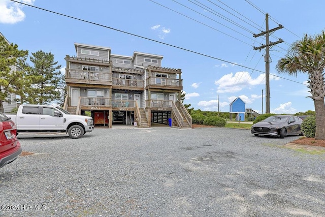 1785 New River Inlet Rd Unit 2, North Topsail Beach, NC 28460 - view of building exterior featuring stairs