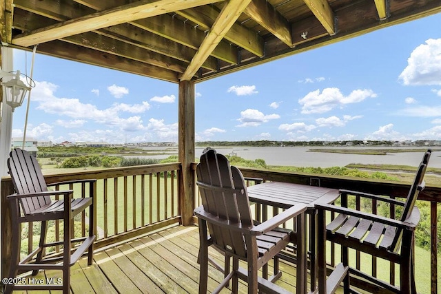 1785 New River Inlet Rd Unit 2, North Topsail Beach, NC 28460 - wooden deck featuring a water view