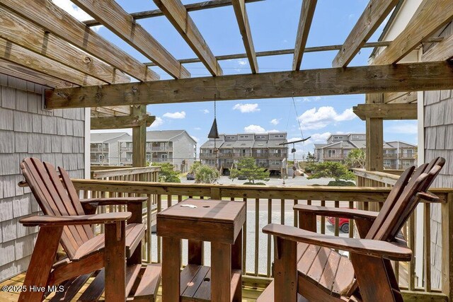 1785 New River Inlet Rd Unit 2, North Topsail Beach, NC 28460 - wooden deck featuring a residential view
