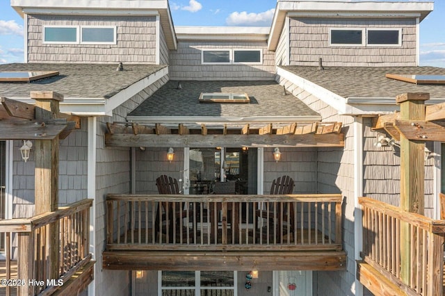 1785 New River Inlet Rd Unit 2, North Topsail Beach, NC 28460 - back of house with roof with shingles and a wooden deck