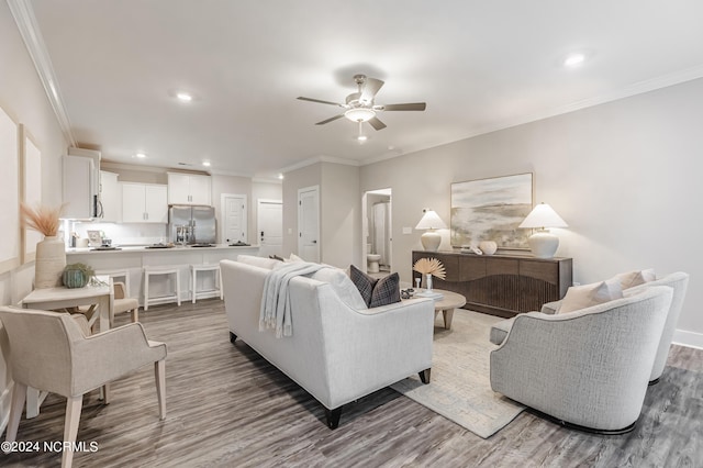 395 S Crow Creek Dr Unit 1712, Calabash, NC 28467 - living room featuring wood finished floors, ornamental molding, ceiling fan, and recessed lighting