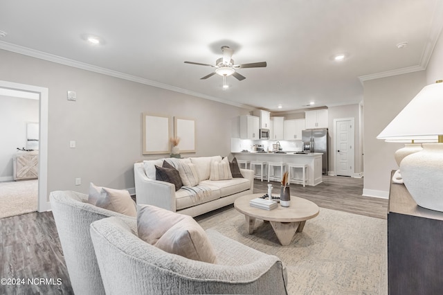 395 S Crow Creek Dr Unit 1712, Calabash, NC 28467 - living room featuring ceiling fan, crown molding, wood finished floors, and recessed lighting