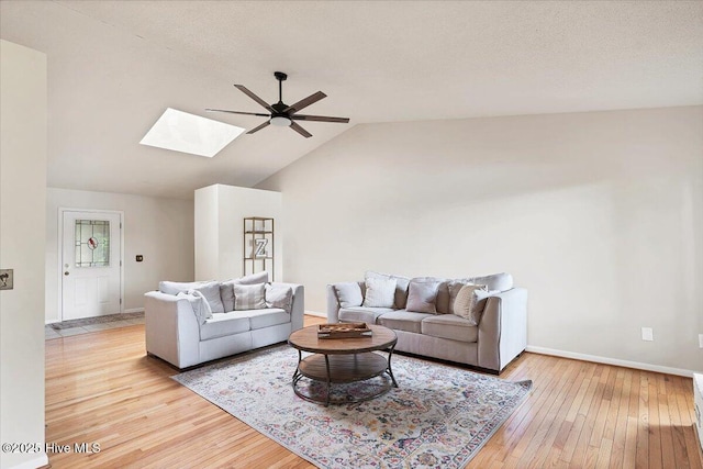120 Shagbark Ct, Seven Lakes, NC 27376 - living area with a ceiling fan, a skylight, hardwood / wood-style floors, and lofted ceiling