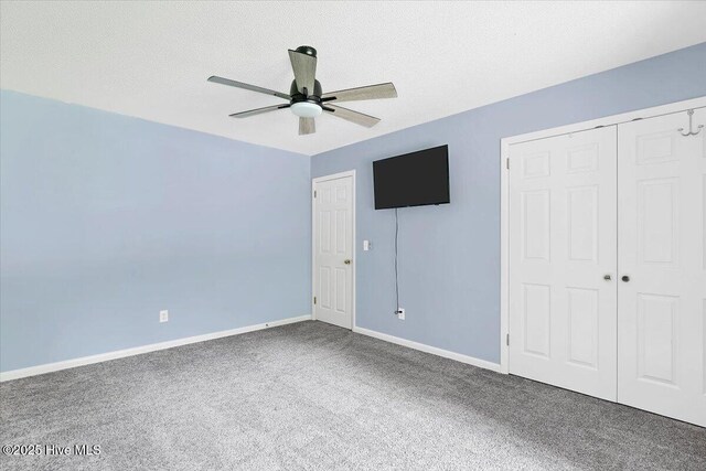 120 Shagbark Ct, Seven Lakes, NC 27376 - unfurnished bedroom with carpet flooring, ceiling fan, a textured ceiling, and a closet