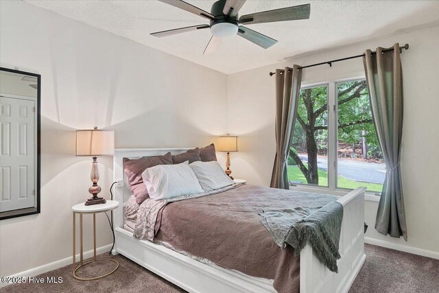 120 Shagbark Ct, Seven Lakes, NC 27376 - bedroom featuring carpet flooring, a textured ceiling, and ceiling fan