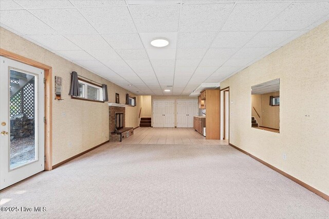 120 Shagbark Ct, Seven Lakes, NC 27376 - below grade area featuring light carpet, stairway, and a fireplace