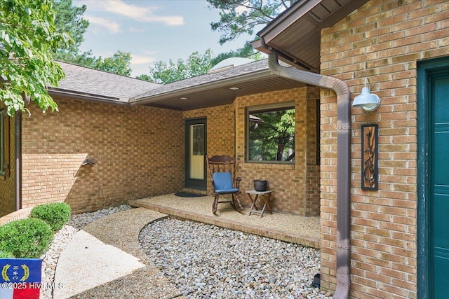 120 Shagbark Ct, Seven Lakes, NC 27376 - doorway to property featuring brick siding and roof with shingles