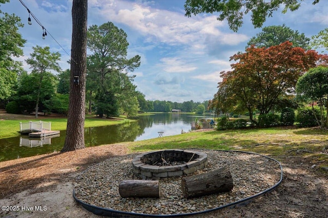 120 Shagbark Ct, Seven Lakes, NC 27376 - view of yard with an outdoor fire pit and a water view