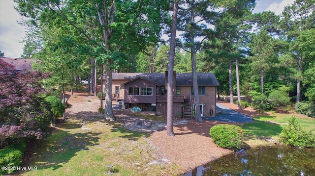 120 Shagbark Ct, Seven Lakes, NC 27376 - back of house featuring stairs and a deck