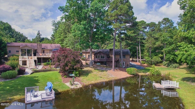 120 Shagbark Ct, Seven Lakes, NC 27376 - dock area with stairs, a yard, and a deck with water view