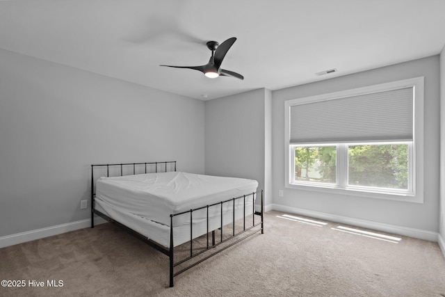 1035 Bent Blade Ln, Wilmington, NC 28411 - carpeted bedroom with baseboards and a ceiling fan