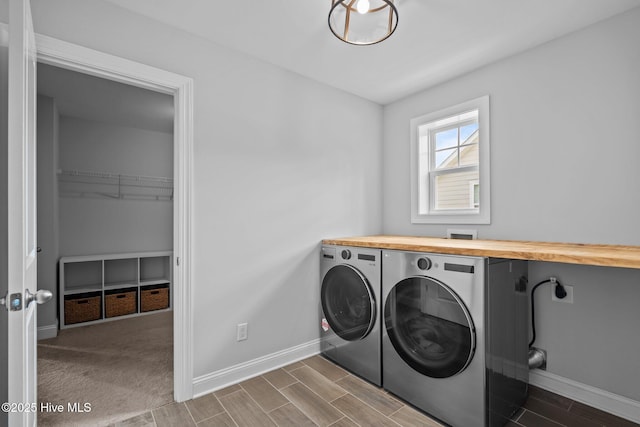 1035 Bent Blade Ln, Wilmington, NC 28411 - laundry area featuring washer and dryer and wood finish floors
