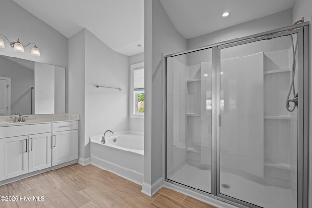 1035 Bent Blade Ln, Wilmington, NC 28411 - full bath featuring vanity, a stall shower, and a garden tub