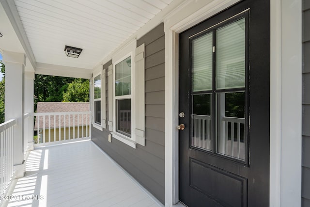 1035 Bent Blade Ln, Wilmington, NC 28411 - view of exterior entry with a porch