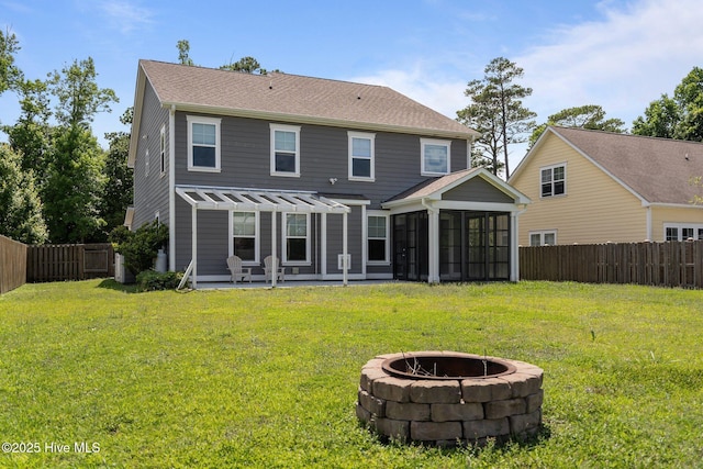 1035 Bent Blade Ln, Wilmington, NC 28411 - rear view of property with a fire pit, a sunroom, a pergola, and a fenced backyard