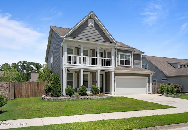 1035 Bent Blade Ln, Wilmington, NC 28411 - greek revival house with a balcony, concrete driveway, an attached garage, and covered porch