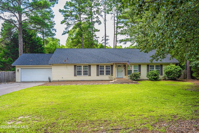 1360 Rays Bridge Rd, Whispering Pines, NC 28327 - ranch-style house with concrete driveway, a garage, and a shingled roof