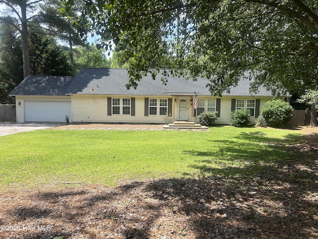 1360 Rays Bridge Rd, Whispering Pines, NC 28327 - ranch-style house with concrete driveway and a garage