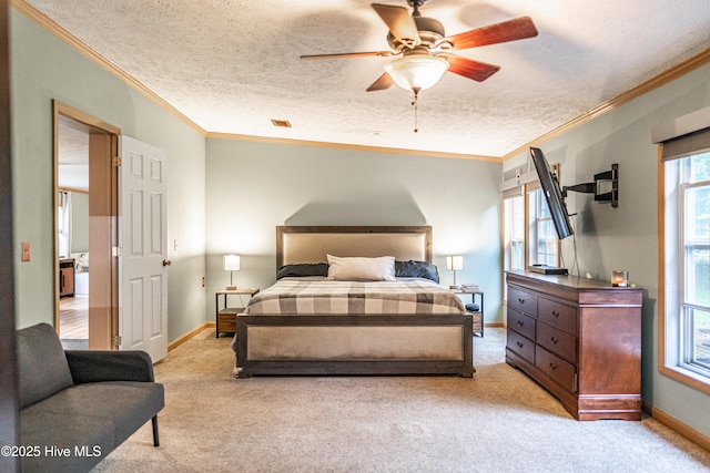 1360 Rays Bridge Rd, Whispering Pines, NC 28327 - bedroom featuring crown molding, light carpet, a textured ceiling, and ceiling fan