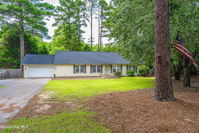 1360 Rays Bridge Rd, Whispering Pines, NC 28327 - ranch-style home featuring driveway, an attached garage, and roof with shingles