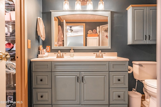 1360 Rays Bridge Rd, Whispering Pines, NC 28327 - bathroom featuring a ceiling fan and double vanity