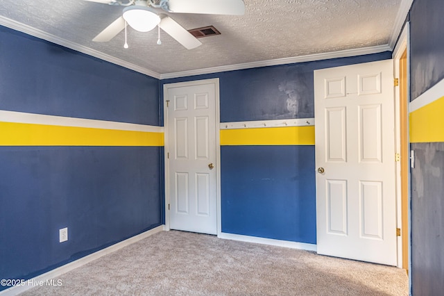 1360 Rays Bridge Rd, Whispering Pines, NC 28327 - unfurnished bedroom with carpet, a textured ceiling, and crown molding