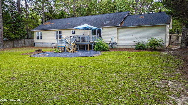 1360 Rays Bridge Rd, Whispering Pines, NC 28327 - back of property featuring a wooden deck, a fenced backyard, a shingled roof, crawl space, and stairs